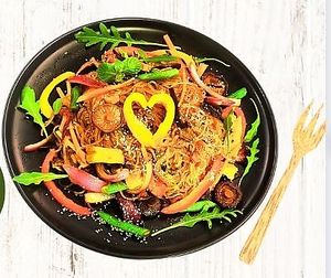 HANOI SIGNATURE
Stir-Fried Transparent Noodles, Carrots, Bell Peppers, Local Seasonal Vegetables & Herbs, Wood-Ear Mushroom, Vegan Baloney, EasyVegan’s Sauces.
 at Easy Vegan in Hoi An