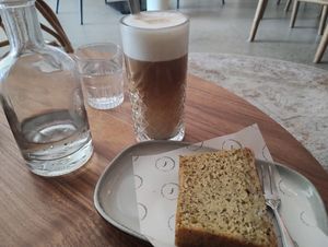 Lemon poppy cake & oat latte at The Coffee Spot  in Haarlem