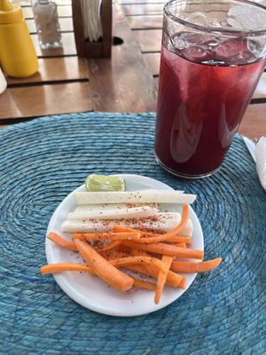Jícama y zanahoria de entrada gratis  at Ten Ten Pie Al Carbon in San Miguel De Allende