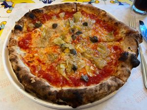 Vegan Pizza Capri (Tuna, capers, artichokes, cheese)  at Bottega di Rosaria in Siena