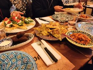 Hummus, patate libanesi, pizza libanese, falafel, baba ganouj, mutabal, tabulè, insalate, riso, verdure at Due Tradizioni - Cucina Libanese e Italiana in Milan