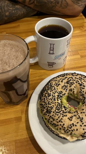 Bagel homus, chocolate batido  at Cupping Café in Sao Paulo