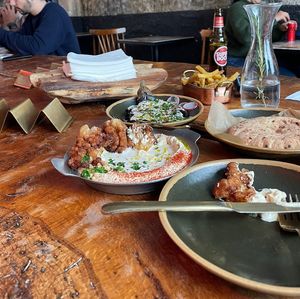 Hummus wort fried cauliflower is quite a great option 😋   at Cult of Pita in Porto