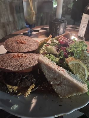 Beetroot/kidney bean burger and almond cheese on the side  at Radost Fina Kuhinjica in Belgrade