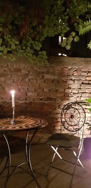 Romantic outdoor seating at Radost Fina Kuhinjica in Belgrade