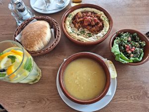 Hummus with eggplant, tebula salad and lentil soup at Trója in Szeged
