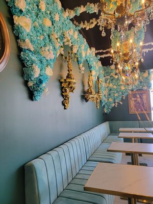Inside seating at Unicorniverse Bakery & Cafe in Round Rock