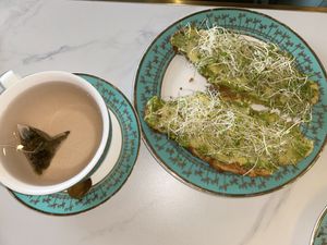 Strawberry oolong tea and the avocado toasted croissant    at Unicorniverse Bakery & Cafe in Round Rock