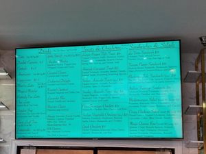 Todays menu. What you can’t see is the display case full of macarons and pastries!   at Unicorniverse Bakery & Cafe in Round Rock