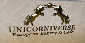 Logo   at Unicorniverse Bakery & Cafe in Round Rock