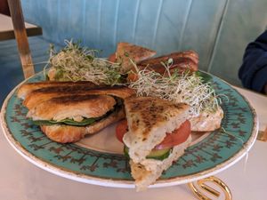 Bottom tier of afternoon tea, 3 sandwiches at Unicorniverse Bakery & Cafe in Round Rock