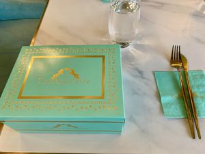 Takeout box  at Unicorniverse Bakery & Cafe in Round Rock