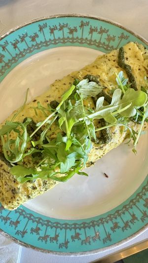 Cheese Omelette with pesto   at Unicorniverse Bakery & Cafe in Round Rock