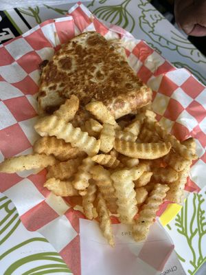 Cheeseburger quesadilla with French fries  at Mike's Vegan Grill in Greensboro