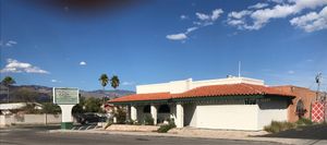 Turn into off street parking lot by sign. at Zayna Mediterranean in Tucson