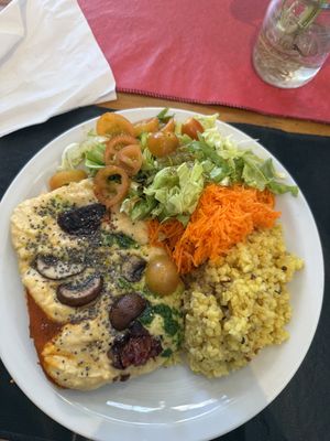 Milanesa de Garbanzo with vegan cheese and salad  at Vegetariana in Buenos Aires