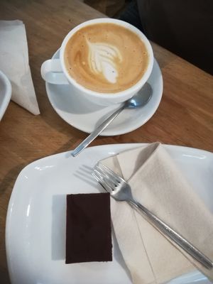 Raw vegan cake and rice milk cappuccino at Ecocafe in Budapest