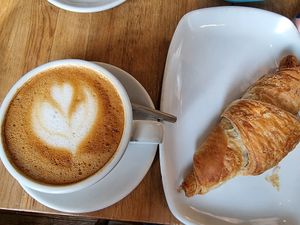Oatmilk cappuccino and vegan chocolate croissant #Veganuary at Ecocafe in Budapest