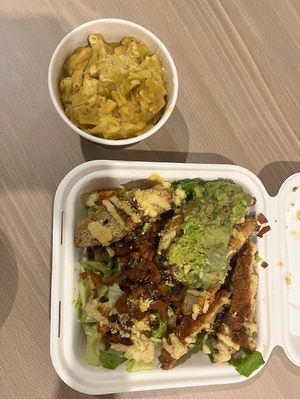 Caesar salad with Mac & cheese  at Two-Bit Villains in Adelaide