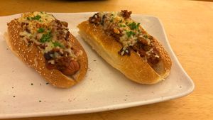 Chilli dog w vegan cheesee  at Two-Bit Villains in Adelaide