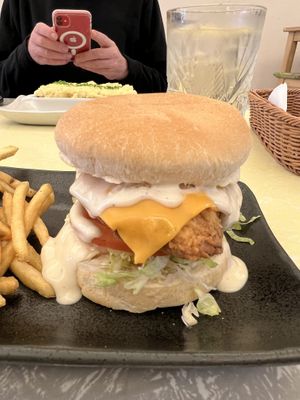 The Jailbird - 
'Buttermilk fried chicken' (soy, gluten), lettuce, tomato, cheese with housemade aioli (and vegan cheese)    at Two-Bit Villains in Adelaide