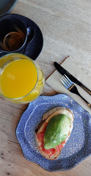 Toast with hummus, avocado and tomato at GRONX Zurriola in San Sebastian