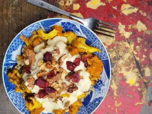 Roasted cauliflower, quinoa, tahini dressing, cranberry, walnuts at Café Studio in Paris
