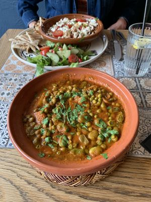 Tebikha vegetable tagine (vegan & gf) Dish in the back - vegetarian checkhouka   at Al Casbah in Cambridge