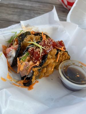 Sushi Tacos - tempura nori shell, sushi rice, ahi watermelon, avocado, carrot, pickled ginger, kimchi mayo, sesame seeds, scallions, side of wasabi ponzu sauce  at Mean Mandy's in Asheville