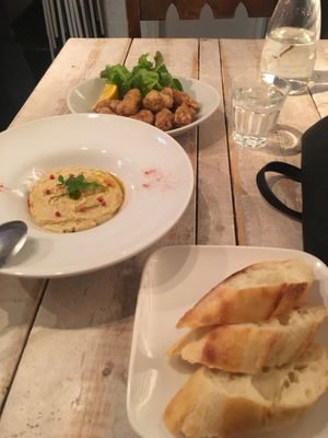 Hummus and bread and then crispy chicken in the back at AIN SOPH.Journey in Tokyo