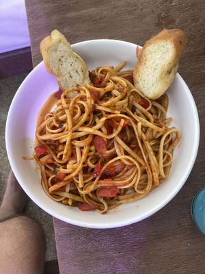 Customised pasta (pepper, chilli and herbs) and vegan garlic bread   at Mandala Beach Club  in Cancun