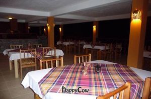 Sunshine Cottage restaurant by night at Sunshine Cottage in Roseau