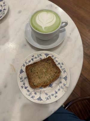 Oat milk matcha latte with vegan zucchini bread  at Keeper Coffee Co in Portland