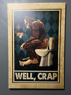 A poster inside a restroom… didn’t I see this one on DEViantArt?   at Devs Coffee Bar in Battle Ground