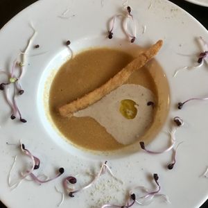 Consommé de maïs, jus de chicon grillé et salsifis pané   at Bar Recyclart in Brussels
