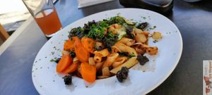Penne with sun-dried tomato pesto, grilled vegetables and black olives. at Bar Recyclart in Brussels