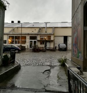 The restaurant is in the courtyard at Bar Recyclart in Brussels