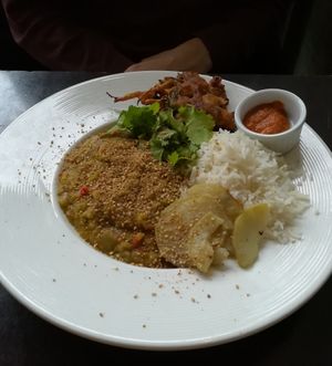 Dahl-lentil and rice dish with spicy sauce at Bar Recyclart in Brussels