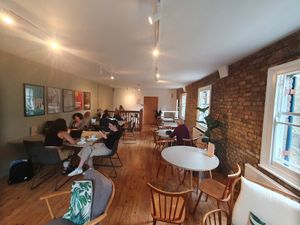 Upstairs seating (laptop area) at Kentish Town Stores in London