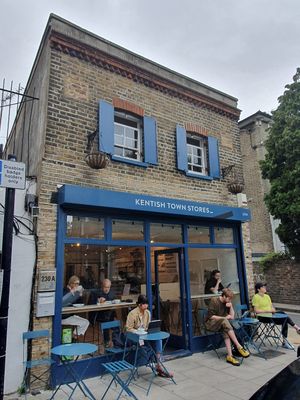 Exterior and outdoor seating at Kentish Town Stores in London