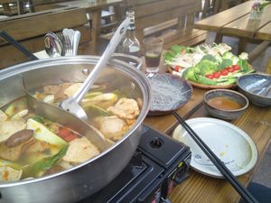 the hot pot with all its ingedients on the far left at Loy Vegan in Trier