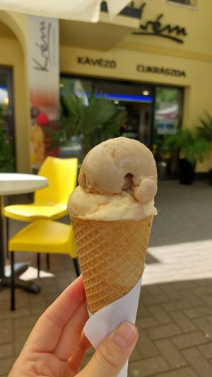 Melon and "Almond Garten" ice cream at Krém Cukrászda és Kávézó in Szekesfehervar