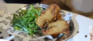 Dirty croquettes

Homemade STUFFING with mushrooms and smoked soy paste, delicate jelly, fine crispy breading and bound ravigote sauce at Faubourg Daimant in Paris