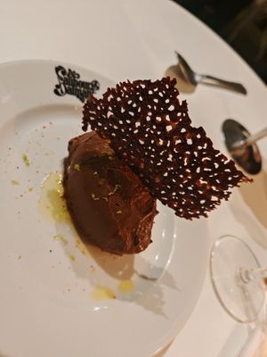 CHOCOLATE GANACHE

COMFORTING MILKY CHOCOLATE GANACHE, OLIVE OIL, LIME, ESPELETTE PEPPER, ALL-COCOA TUILE at Faubourg Daimant in Paris