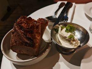 SMOKED BUTTER QUENELLE

HOMEMADE WHIPPED BUTTER, BEECHWOOD-SMOKED SALT at Faubourg Daimant in Paris
