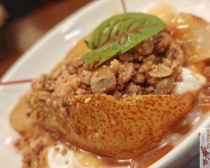 Caramelized pear, vanilla yogurt, caramel sauce, graola, sorrel sprouts at Faubourg Daimant in Paris