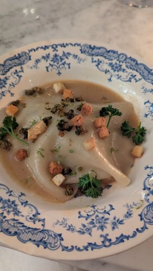 Ravioli with croutons, capers, and parsley at Faubourg Daimant in Paris