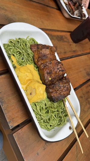 Pesto con anticuchos  at Oiga in Lima