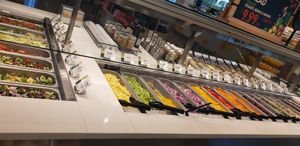 Multiple aisles of Salad Bar at Lazy Acres in Los Angeles