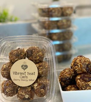 These energy bites are the perfect snack for on-the-go or as a pre-workout boost. Made with simple, plant-based ingredients, they're also a great way to satisfy your sweet tooth! at Vibrant Beat Cafe in Fort Myers